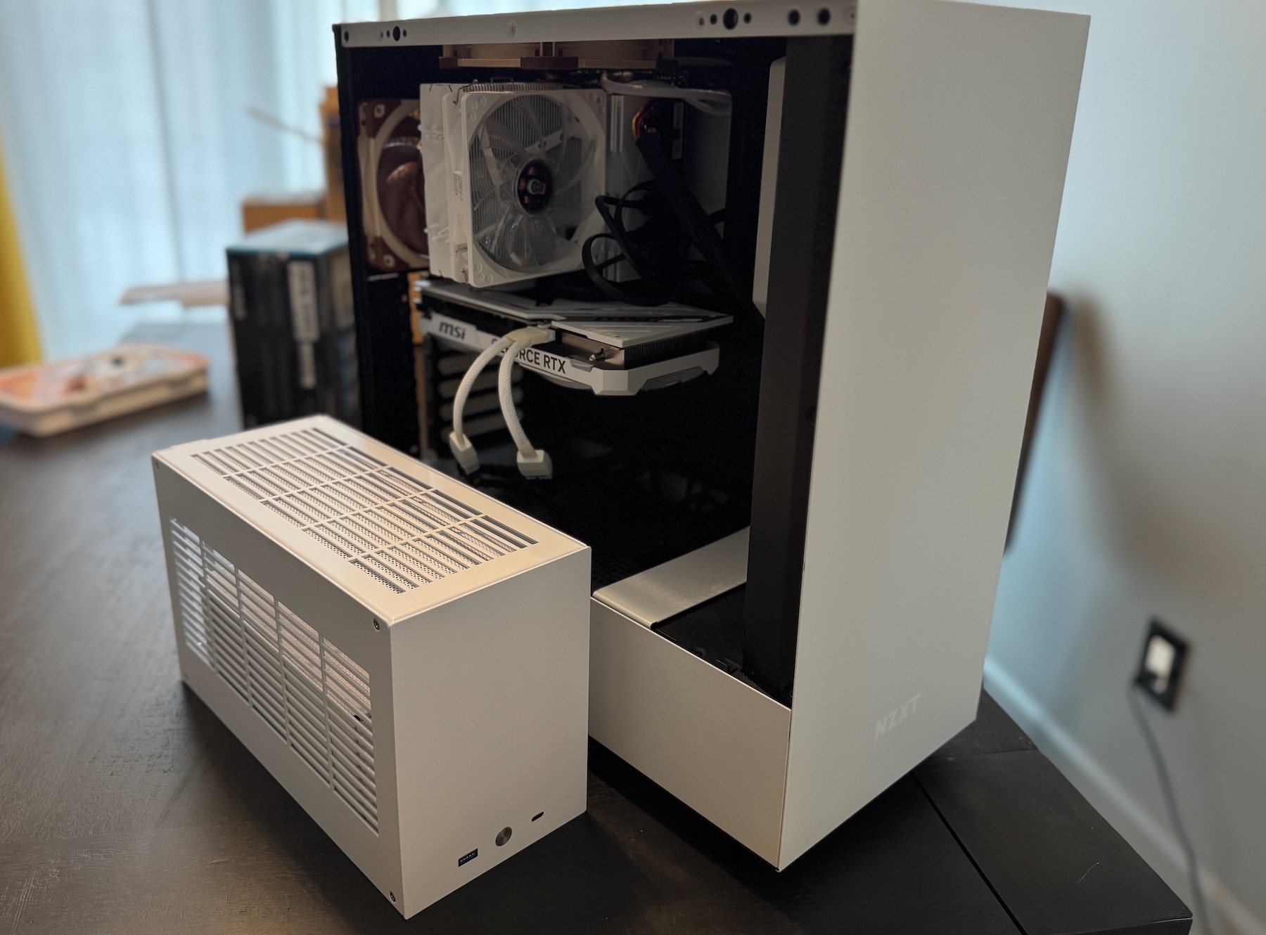 My new case next to my old case. Size matters. I prefer small.